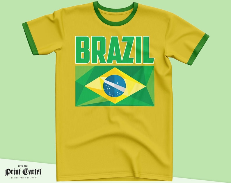 May include: Yellow t-shirt with a green and yellow Brazilian flag and the word "BRAZIL" in green letters.