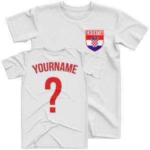 May include: White t-shirt with a red question mark on the back and a Croatian flag patch on the front. The text "YOURNAME" is above the question mark.