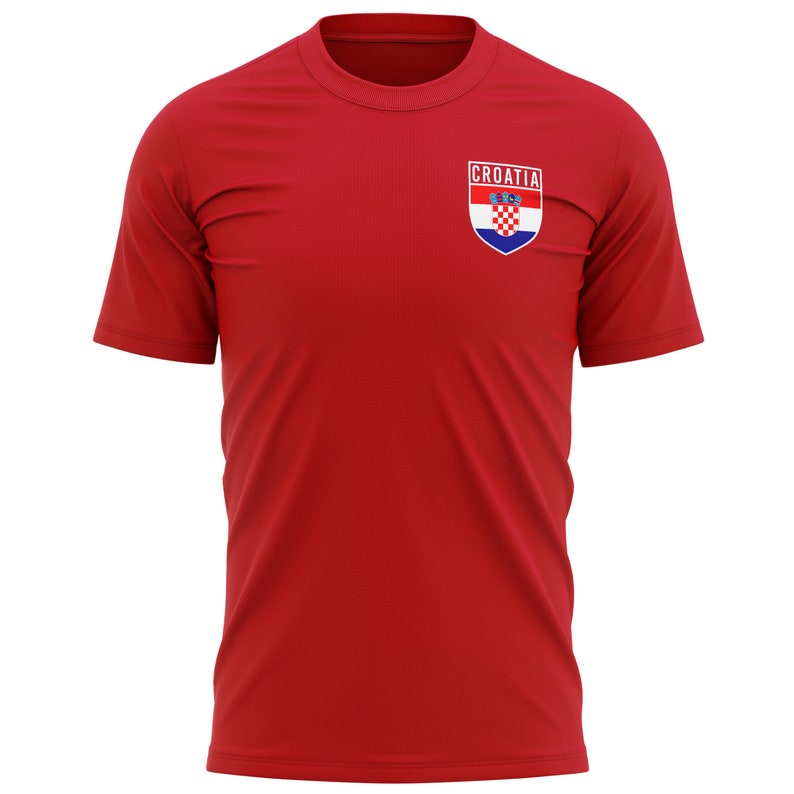 May include: Red t-shirt with a small embroidered patch featuring the Croatian coat of arms and the word "CROATIA" above it.
