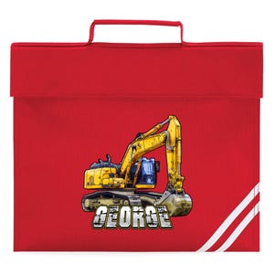 May include: A red school satchel with a yellow excavator graphic and the name "GEORGE" in a bold font. The satchel has a handle and white stripes on the right side.
