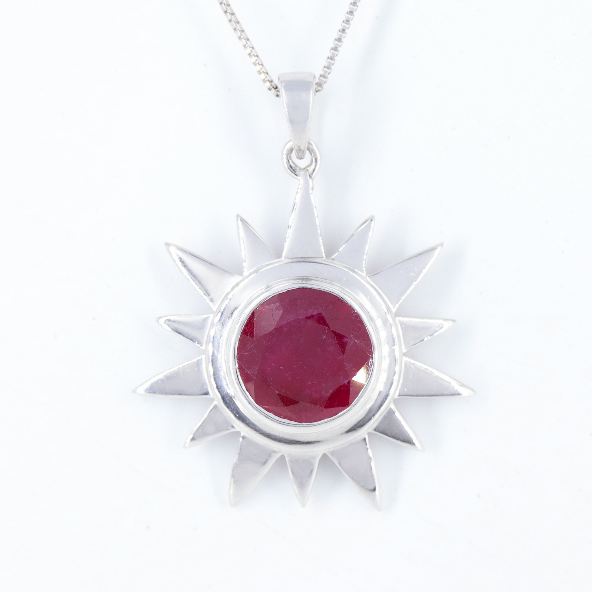 Sun shaped sale pendant