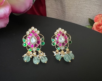 Kundan Jhumuka Earrings: Gold Polish with Red, Green, and Uncut Diamond Stones