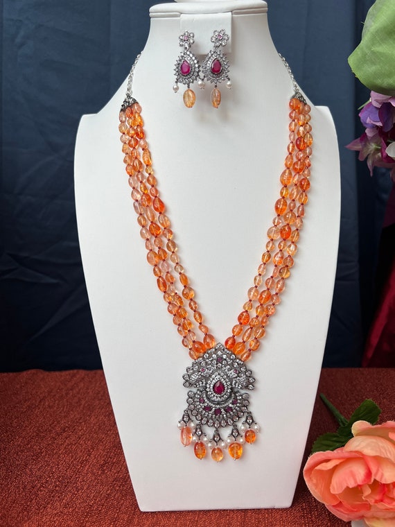 Exotic India Orange Color Beaded Necklace with Earrings Set - White Metal :  Amazon.in: Fashion