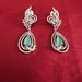 see more listings in the Earrings section