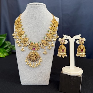 Goddess Lakshmi Peacock CZ Ruby/Antique Gold Finish/Guttapusala Necklace with earrings Pearl Beads Drop /Ruby AD/Indian Jewelry/Gift Jewelry
