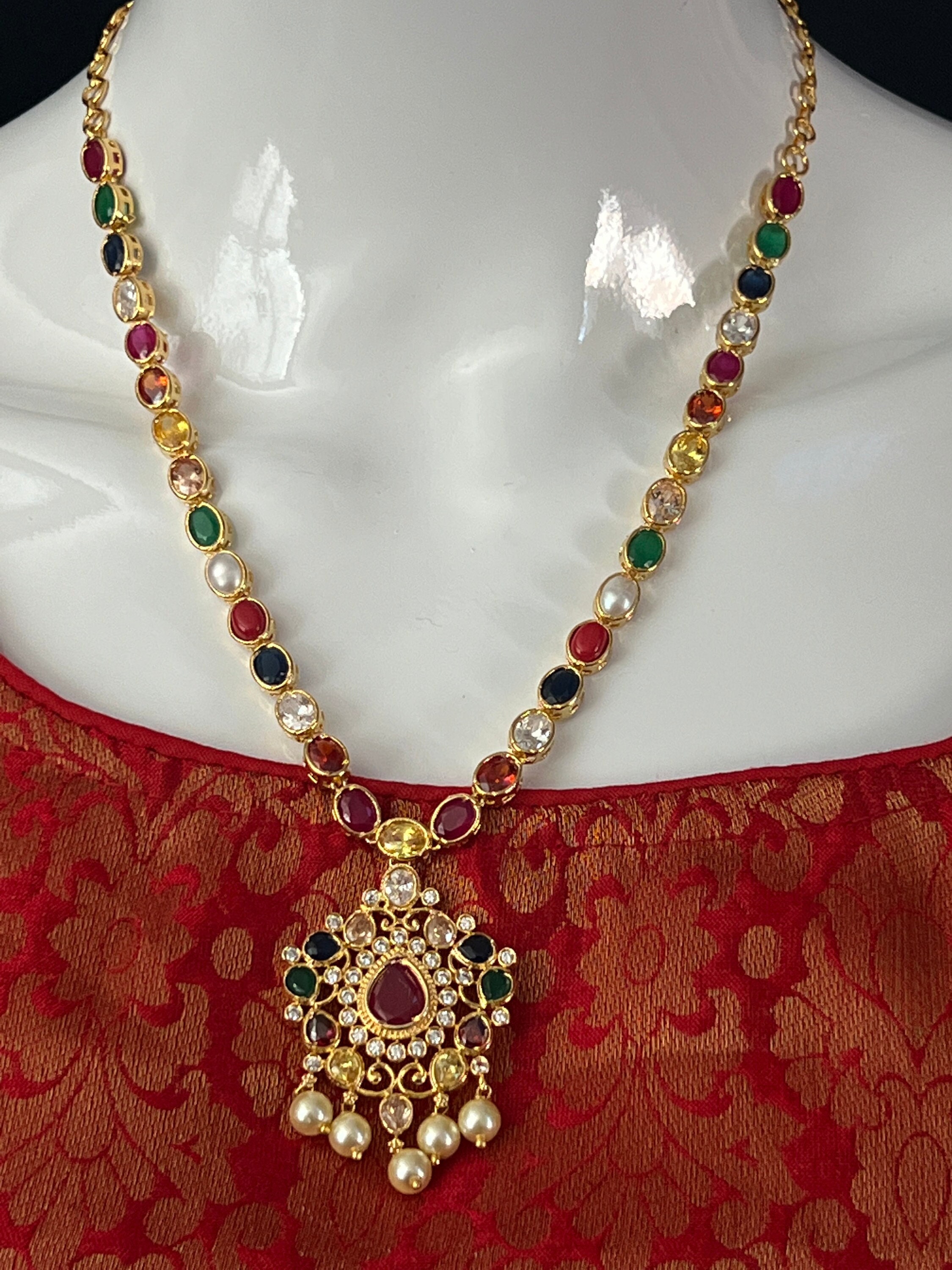 Robustly Vibrant Diamond Navaratna Necklace Set in 18KT Gold