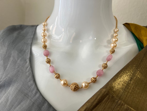 Long store gold beads