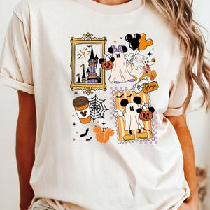 Puede incluir: Camiseta beige con un dise&ntilde;o tem&aacute;tico de Halloween. El dise&ntilde;o incluye im&aacute;genes enmarcadas de un castillo, Mickey Mouse como fantasma, una taza de caf&eacute; y calabazas. Tambi&eacute;n son visibles las palabras "Magic".
