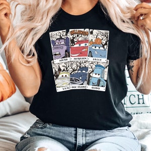 May include: Black t-shirt with a graphic of the Cars characters dressed up for Halloween. The characters include Mater, McQueen, Sally, Luigi, Doc Hudson, and Guido. The text "Halloween" is at the top of the graphic.