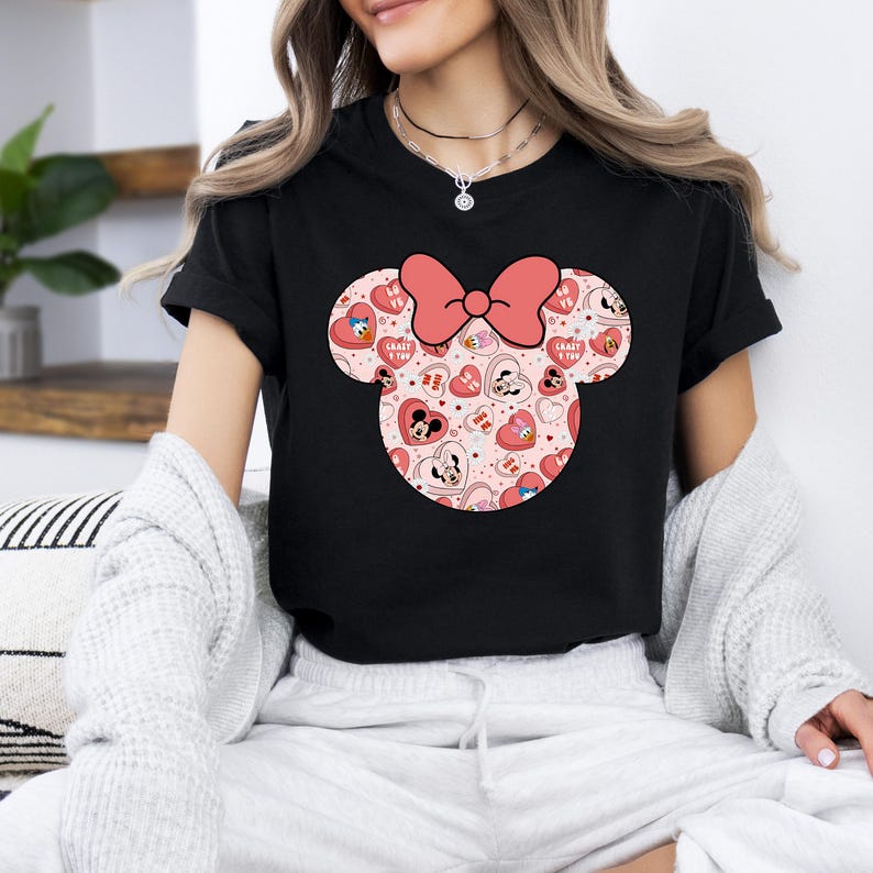 May include: Black t-shirt with a pink and white Minnie Mouse head graphic featuring hearts and the text "Crazy 4 You".