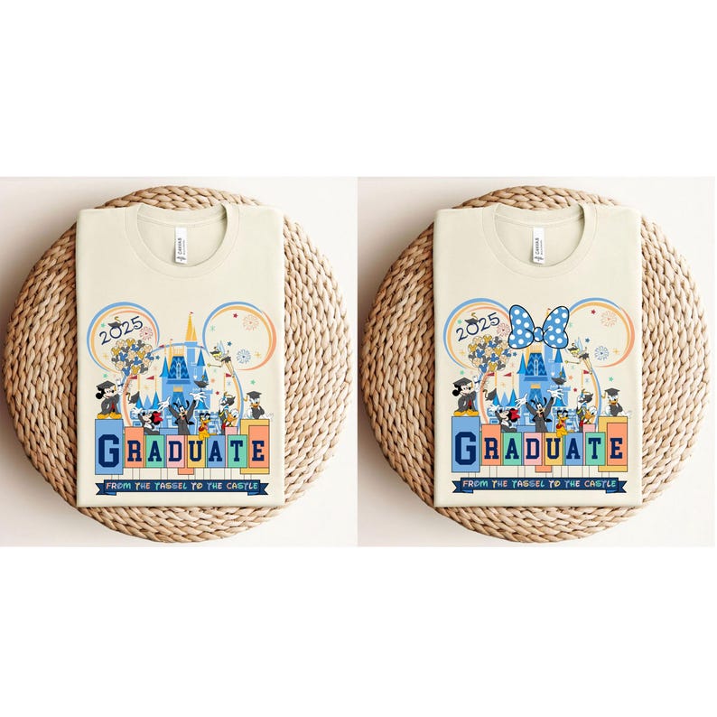 May include: Two beige t-shirts with a graphic design featuring the Cinderella Castle, Mickey Mouse, Minnie Mouse, and other Disney characters. The text "2025 GRADUATE FROM THE TASSEL TO THE CASTLE" is printed on the shirts.
