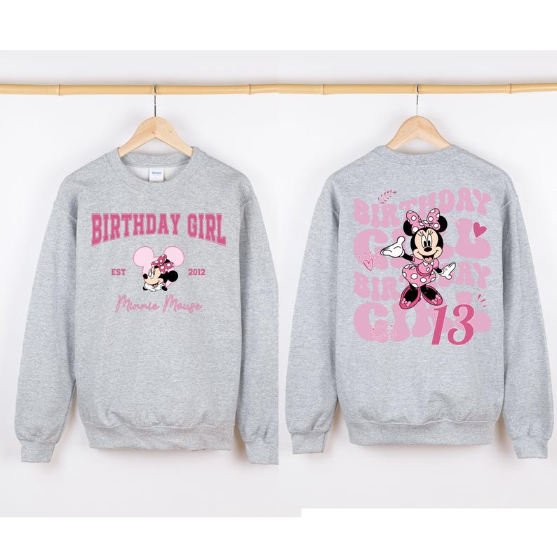 May include: Gray sweatshirt with a pink Minnie Mouse graphic and the text "Birthday Girl" on the front and "Birthday Girl 13" on the back.