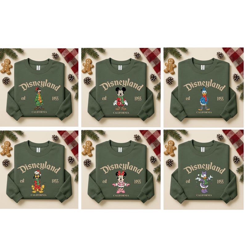 May include: Six olive green sweatshirts with the Disneyland logo and various Disney character designs. Each sweatshirt has the text "Disneyland est 1955 California". The characters include Mickey Mouse, Minnie Mouse, Donald Duck, Daisy Duck, Goofy, and a character in a Christmas outfit.