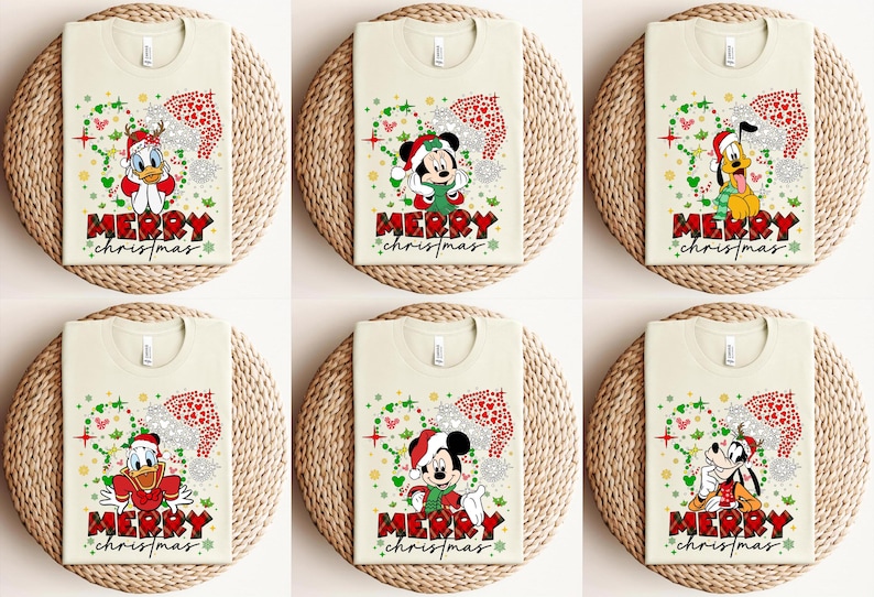 May include: Six beige t-shirts with a Christmas theme featuring Mickey Mouse, Donald Duck, and Goofy. Each shirt has a red and green design with the words "Merry Christmas".