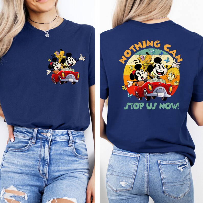 May include: A navy blue t-shirt with a vintage-style graphic of Mickey Mouse, Minnie Mouse, and Pluto driving a red car. The text "Nothing Can Stop Us Now!" is printed on the back of the shirt.