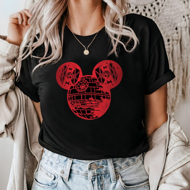 May include: A black t-shirt with a red graphic of a Death Star shaped like Mickey Mouse ears.