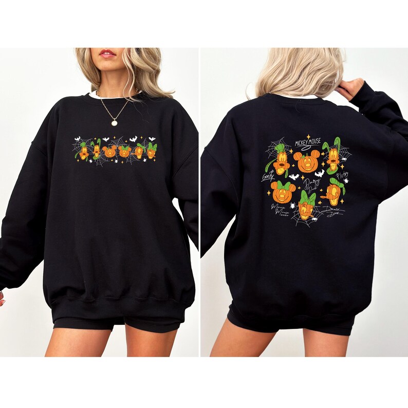 May include: Black sweatshirt with a white collar featuring Halloween-themed Mickey Mouse characters. The front has a row of pumpkins and the text "Boo!". The back displays Mickey Mouse, Goofy, and other characters in pumpkin form, with the text "Mickey Mouse".