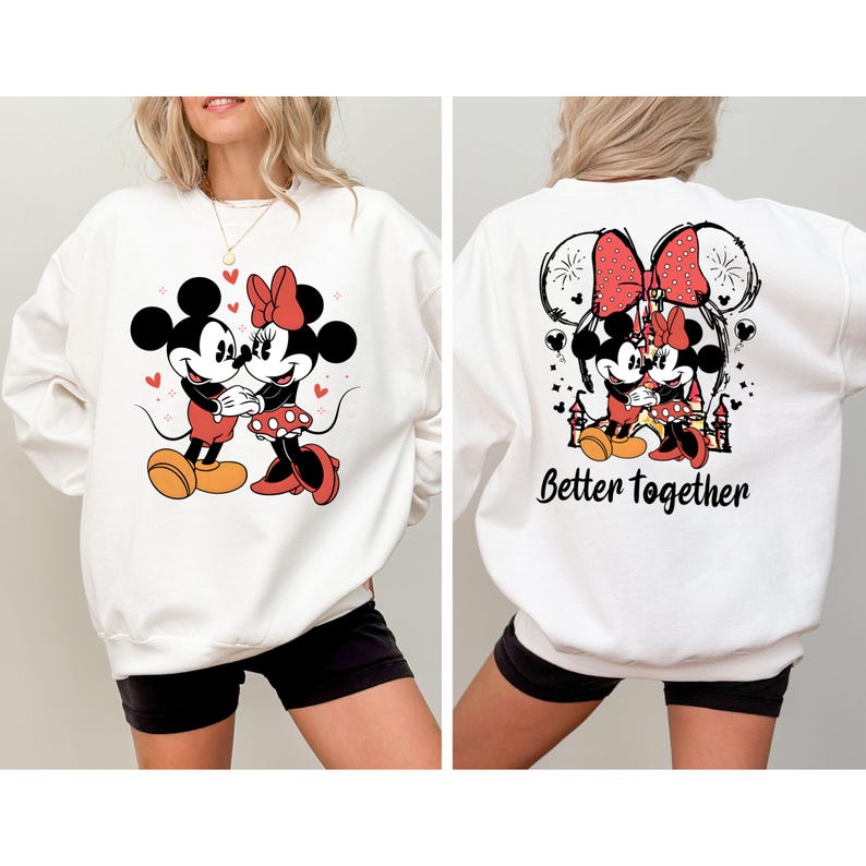 May include: White sweatshirt with a graphic of Mickey Mouse and Minnie Mouse holding hands. The back of the sweatshirt has a graphic of Mickey Mouse and Minnie Mouse hugging with the text "Better Together".