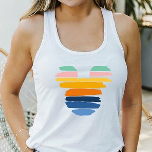 May include: White tank top with a colorful Mickey Mouse design. The design is made up of horizontal stripes in shades of pink, green, yellow, orange, blue, and navy.