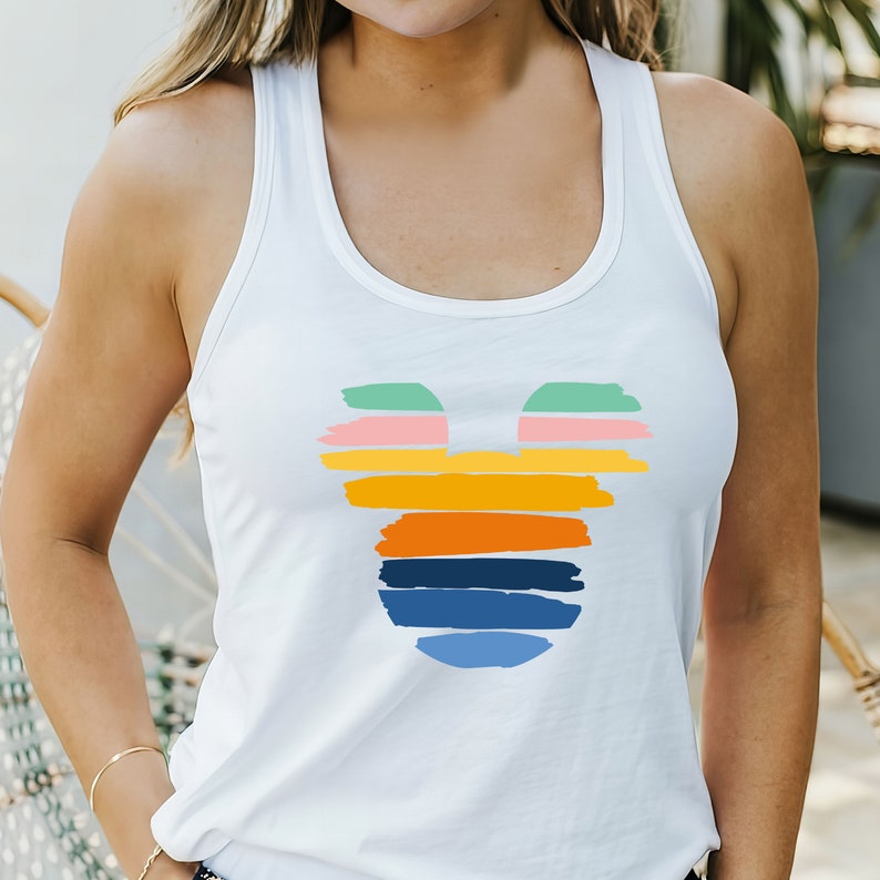 May include: White tank top with a colorful Mickey Mouse design. The design is made up of horizontal stripes in shades of pink, green, yellow, orange, blue, and navy.