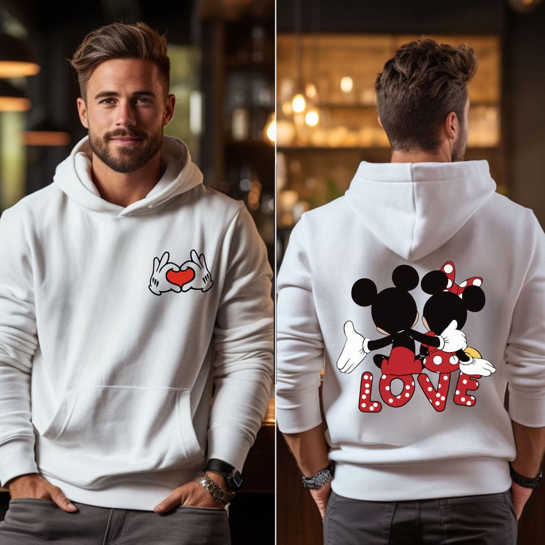 May include: White hoodie with a red heart and hands making a heart shape on the front and a graphic of Mickey Mouse and Minnie Mouse with the word "LOVE" on the back.