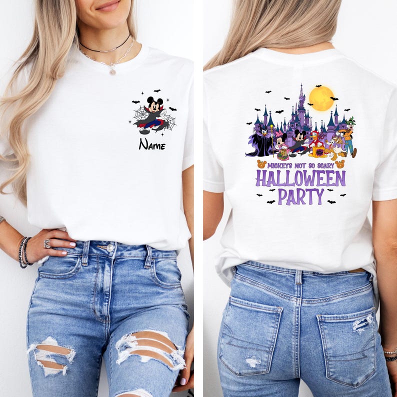 May include: White t-shirt featuring a Halloween-themed design. The front displays a cartoon Mickey Mouse in a vampire costume with the word "Name". The back showcases a spooky castle, characters, and the text "Mickey's Not So Scary Halloween Party".