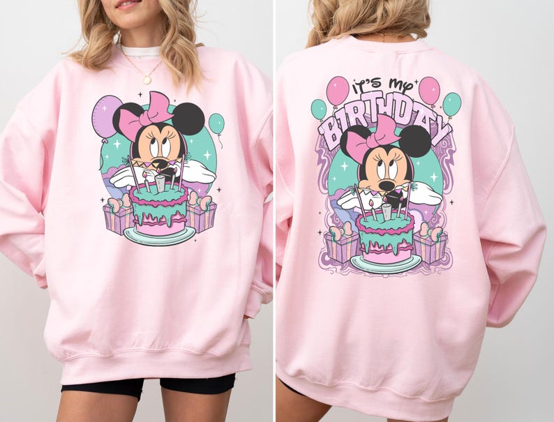 May include: Pink sweatshirt with a graphic of Minnie Mouse holding a birthday cake and the text "It's my Birthday" on the back.