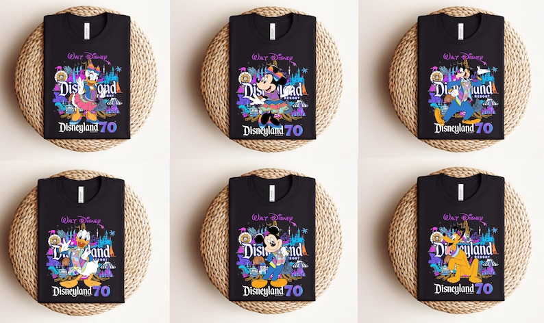 May include: Six black t-shirts with a colorful graphic design featuring various Disney characters. The shirts have the text "Walt Disney" and "Disneyland 70" printed on them.