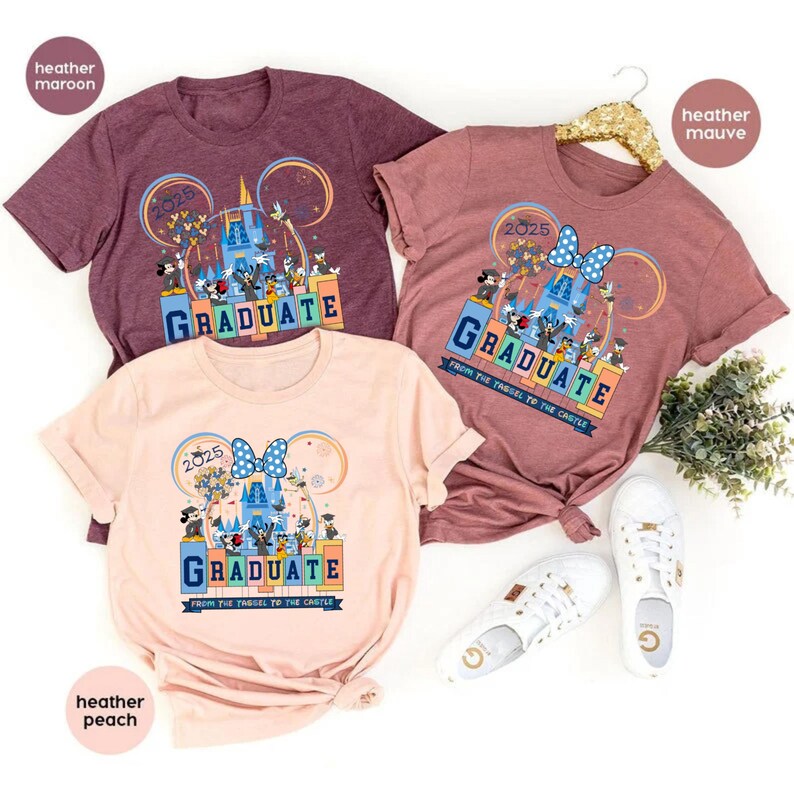May include: Three t-shirts with a Disney theme featuring Mickey Mouse ears, Cinderella's castle, and the text "2025 GRADUATE FROM THE YASUEL TO THE CASTLE". The shirts are in heather maroon, heather peach, and heather mauve.