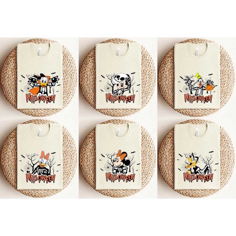 May include: Six cream-colored t-shirts with Halloween-themed graphics. Each shirt features a different cartoon character in a skeleton costume, with the word "Halloween" printed below. The characters include Donald Duck, Mickey Mouse, and Goofy.