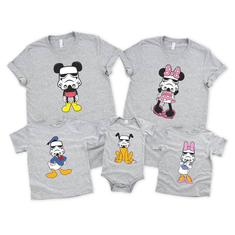 May include: A collection of gray t-shirts and a onesie featuring cartoon characters with Stormtrooper helmets. The characters include Mickey Mouse, Minnie Mouse, Donald Duck, a dog, and Daisy Duck. The shirts have short sleeves.