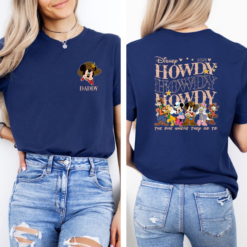 May include: Navy blue t-shirt featuring a cartoon Mickey Mouse in a cowboy hat with the word "DADDY" on the front. The back of the shirt has the text "Disney 2025" and "HOWDY" repeated with Disney characters.