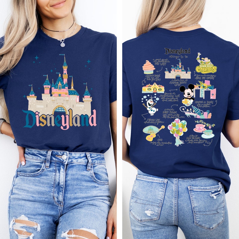 May include: A navy blue t-shirt with a graphic of the Disneyland castle on the front and a graphic of Disneyland attractions on the back. The text "Disneyland" is printed on the front of the shirt.