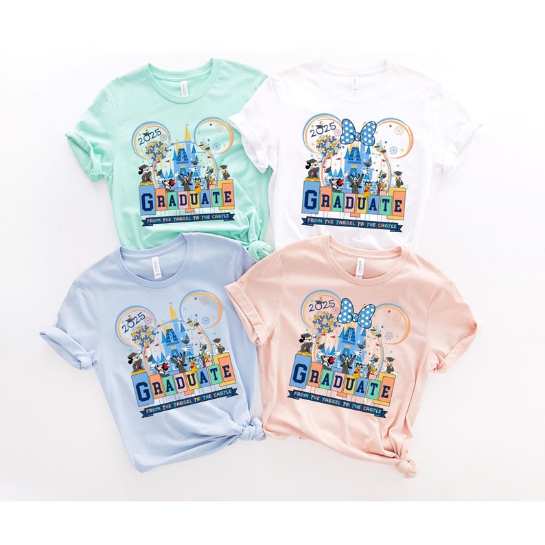 May include: Four t-shirts with a Disney theme, featuring a graphic of Cinderella's castle and Mickey Mouse ears. The shirts are in different colors: light blue, white, light pink, and light green. Each shirt has the text "2025" and "GRADUATE" with the phrase "From the tassel to the castle".