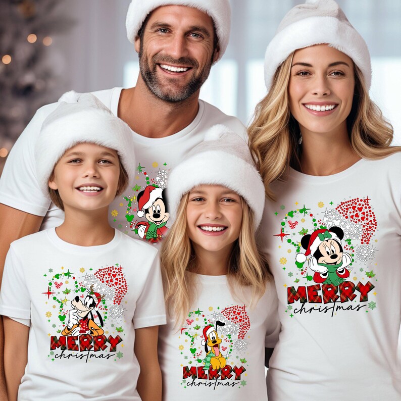 May include: A family of four wearing white t-shirts with a Christmas theme. The shirts feature Mickey Mouse and Pluto with the text "Merry Christmas".