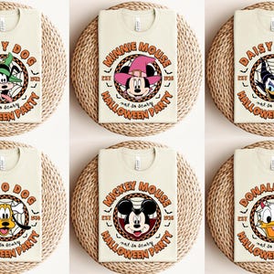 May include: Six different t-shirts featuring various Disney characters in a Halloween theme. Each shirt has a circular design with the character's name, "Halloween Party", and "not so scary" text. The characters include Goofy, Minnie Mouse, Daisy Duck, Pluto, Mickey Mouse, and Donald Duck.