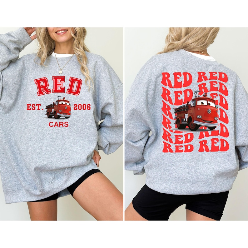 May include: A gray sweatshirt with a red graphic print of a fire truck and the text "RED EST. 2006 CARS" on the front. The back of the sweatshirt has a red graphic print of the text "RED RED RED RED RED RED RED RED RED RED" in a repeating pattern.
