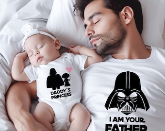 May include: A sleeping baby wearing a white onesie with a black graphic of Darth Vader and a child holding a pink balloon, with the text "DADDY'S PRINCESS". A man wearing a white t-shirt with a Darth Vader graphic and the text "I AM YOUR FATHER" is sleeping next to the baby.