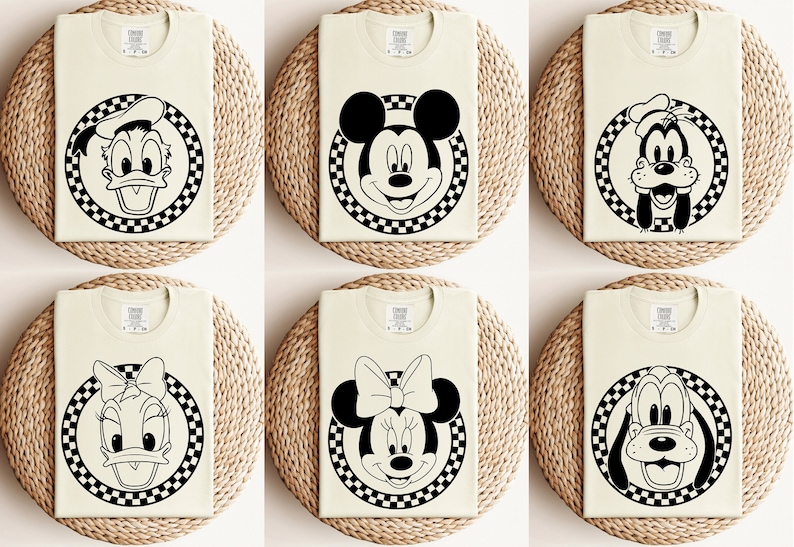 May include: Six white t-shirts with black and white chequered circles featuring different Disney characters: Donald Duck, Mickey Mouse, Goofy, Daisy Duck, Minnie Mouse, and Pluto.