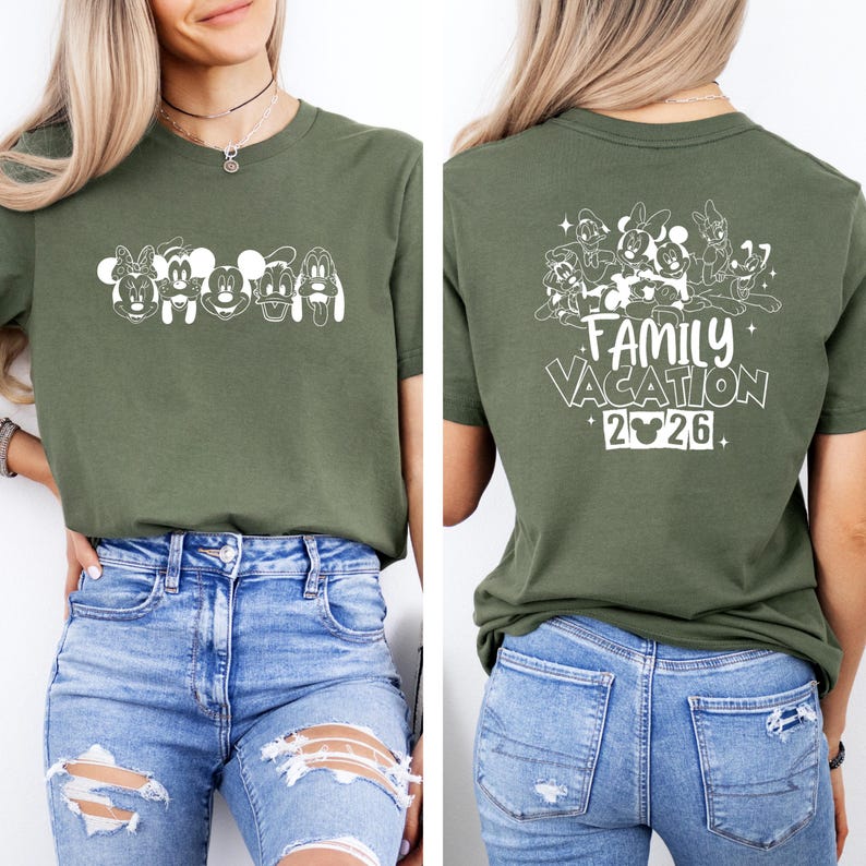 May include: Olive green t-shirt featuring a white graphic of cartoon characters on the front. The back of the shirt displays a group of characters with the text "Family Vacation" and the year "2026". The shirt is made of a soft material and is suitable for casual wear.