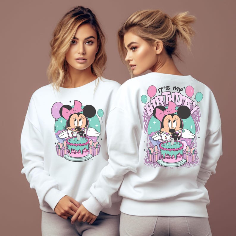 May include: White sweatshirt with a graphic of Minnie Mouse holding a birthday cake and the text "it's my birthday".
