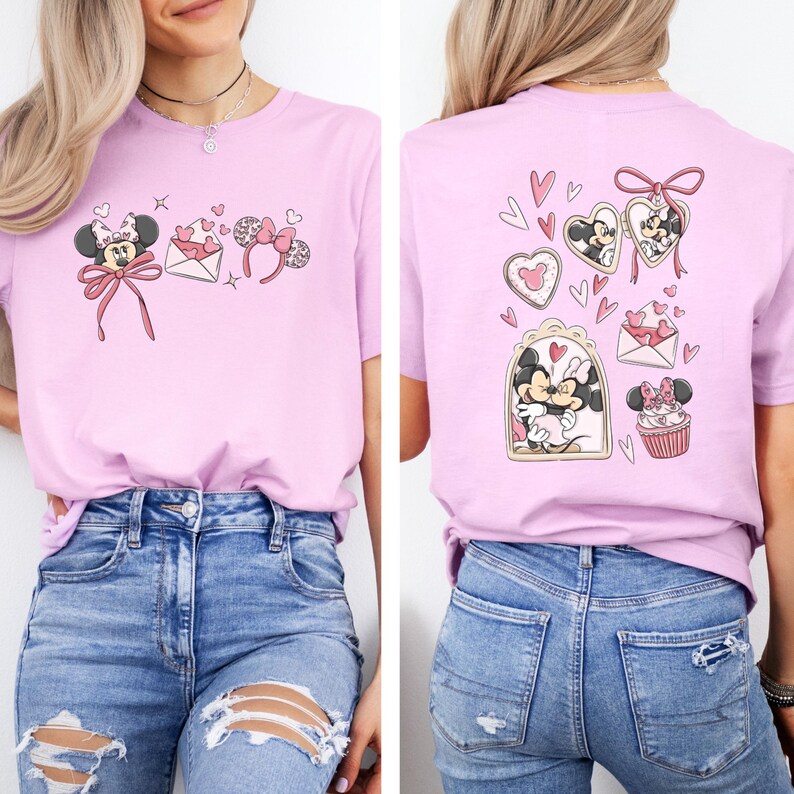 May include: A light pink t-shirt featuring Minnie Mouse-themed graphics. The front displays Minnie with a bow, hearts, and a headband. The back showcases Minnie in a heart-shaped frame, a cupcake, and other heart-themed designs. The shirt is made of a soft material.