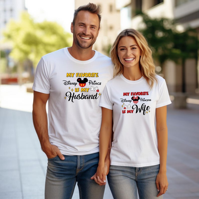 May include: Matching white t-shirts with the text "MY FAVORITE Disney Prince IS MY Husband" and "MY FAVORITE Disney Princess IS MY Wife". The shirts feature Mickey and Minnie Mouse designs.