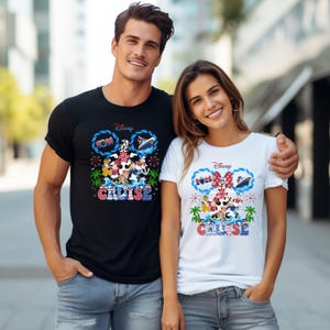 May include: Black and white t-shirts with a Disney Cruise design. The design features Mickey and Minnie Mouse, a cruise ship, and the text "CRUISE" in a colorful font. The shirts are worn by a man and a woman.