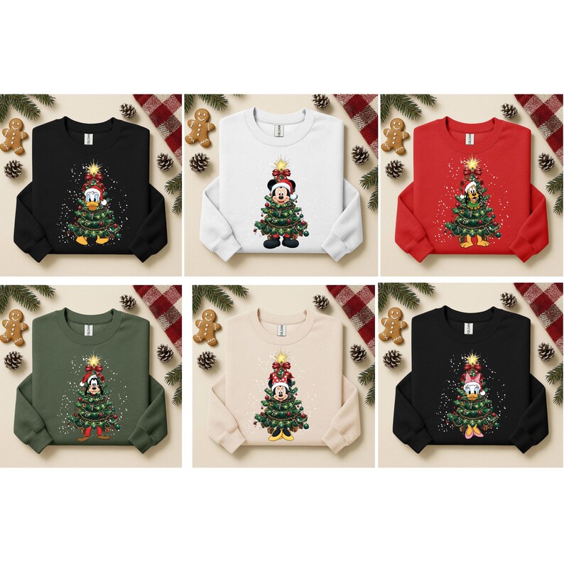 May include: A collection of Christmas-themed sweatshirts in various colors, including black, white, red, green, and beige. Each sweatshirt features a cartoon character decorated as a Christmas tree. The sweatshirts are decorated with Christmas lights and a star.
