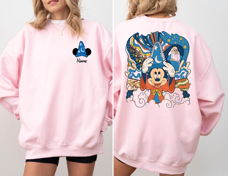 May include: Pink sweatshirt with a Mickey Mouse design on the back and a Mickey Mouse hat design on the front. The text "Name" is printed below the hat design.