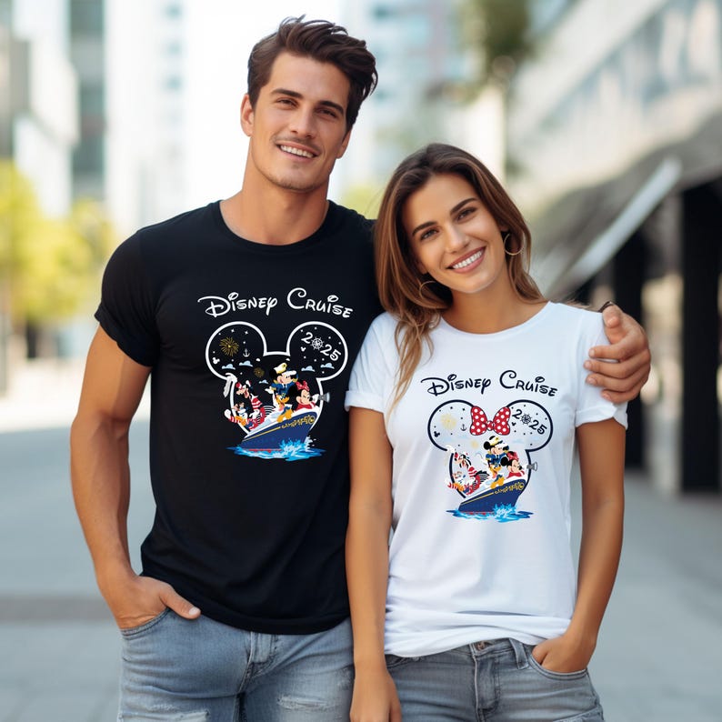 May include: Black and white t-shirts with a Disney Cruise design. The black shirt features a Mickey Mouse head outline with characters on a cruise ship. The white shirt has a Minnie Mouse bow and the same cruise ship design. Both shirts have "Disney Cruise 2025" text.