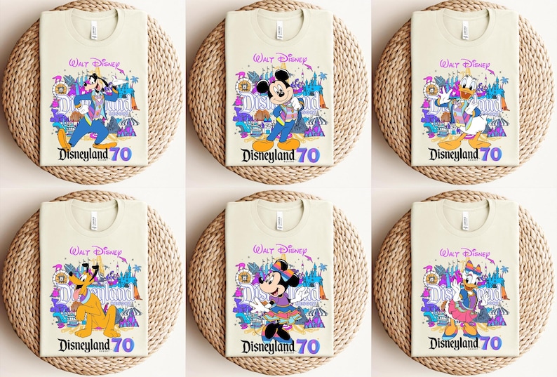 May include: Six beige t-shirts with different Disney characters on them. Each shirt has the text "Walt Disney" and "Disneyland 70" on it. The characters are Mickey Mouse, Donald Duck, Goofy, and Minnie Mouse.