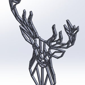 May include: Geometric deer head wall decor made of metal with a black finish. The deer head is a modern and minimalist design.