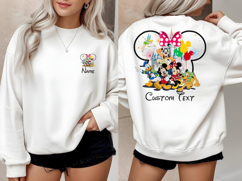 May include: White sweatshirt featuring a Mickey Mouse design with the text "Name" on the front and a larger Mickey Mouse design on the back with the text "Custom Text". The back design includes Mickey, Minnie, Donald, Goofy, and other characters.